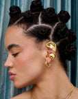 Boucle d'oreille TRUST